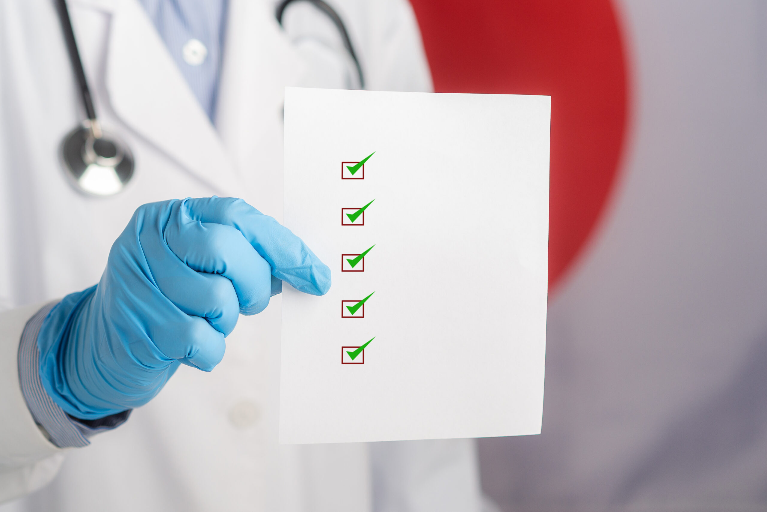 a,doctor,holding,a,white,paper,with,a,checklist,while